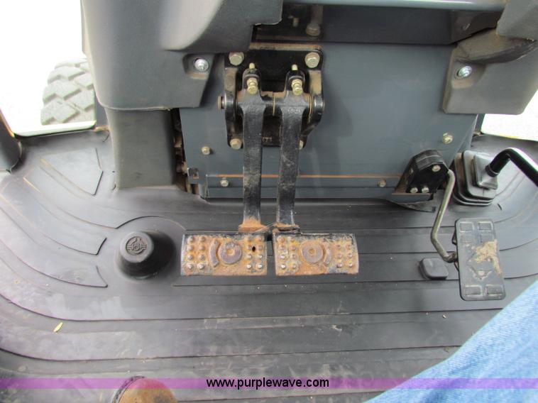 image for item E4168 2004 John Deere 310G backhoe