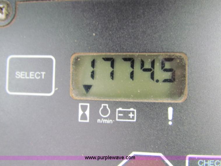 image for item E4168 2004 John Deere 310G backhoe