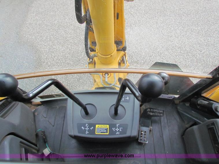 image for item E4168 2004 John Deere 310G backhoe