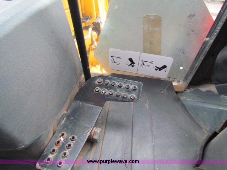 image for item E4168 2004 John Deere 310G backhoe