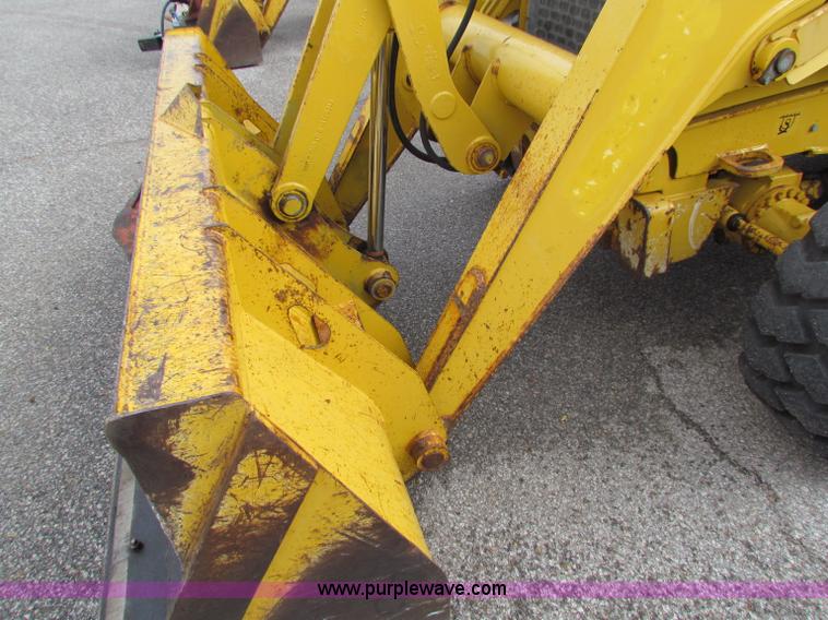 image for item E4168 2004 John Deere 310G backhoe
