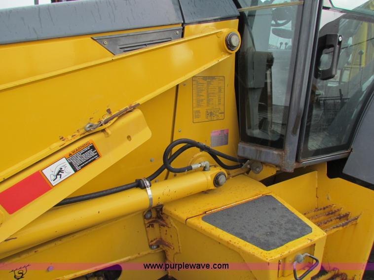 image for item E4168 2004 John Deere 310G backhoe