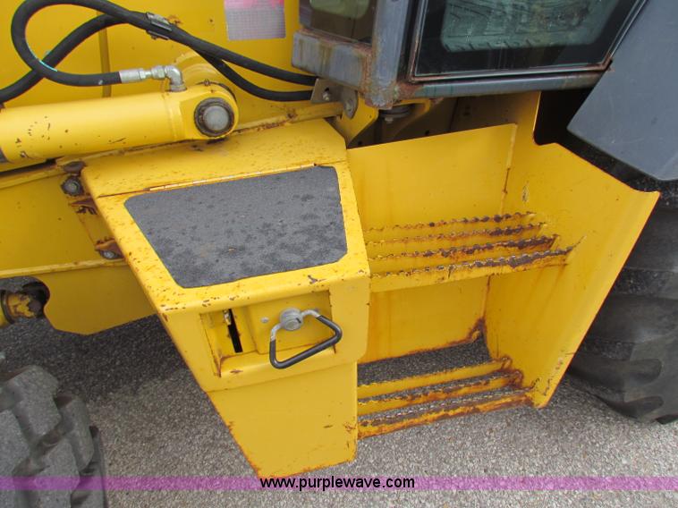 image for item E4168 2004 John Deere 310G backhoe