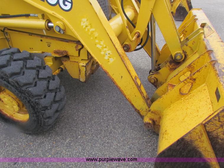 image for item E4168 2004 John Deere 310G backhoe