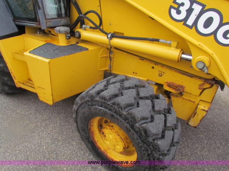image for item E4168 2004 John Deere 310G backhoe