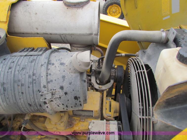 image for item E4168 2004 John Deere 310G backhoe