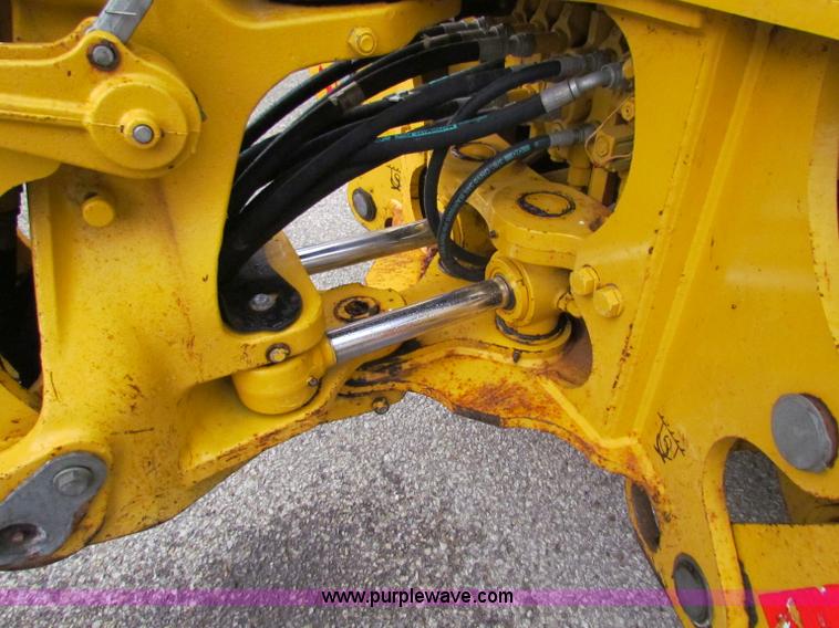 image for item E4168 2004 John Deere 310G backhoe