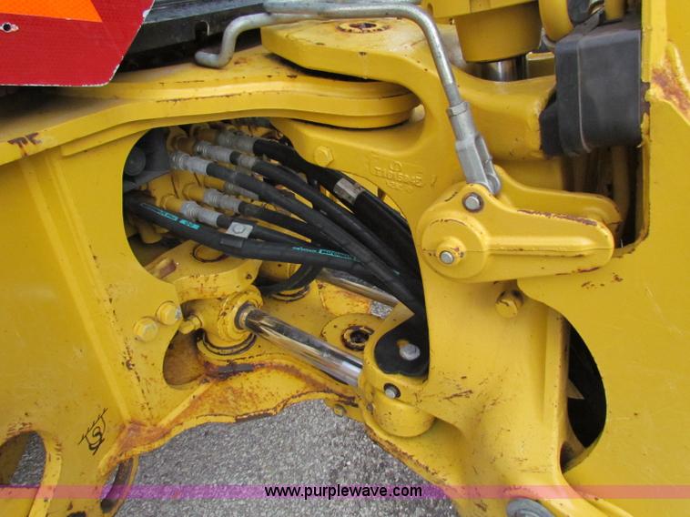 image for item E4168 2004 John Deere 310G backhoe