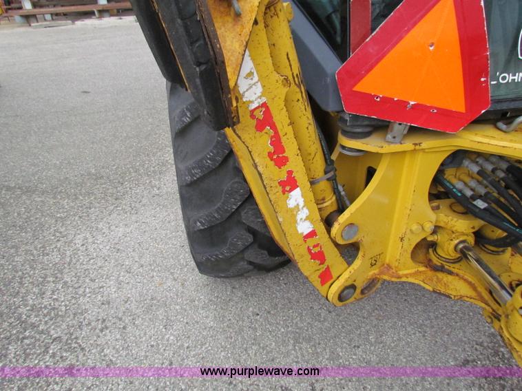 image for item E4168 2004 John Deere 310G backhoe