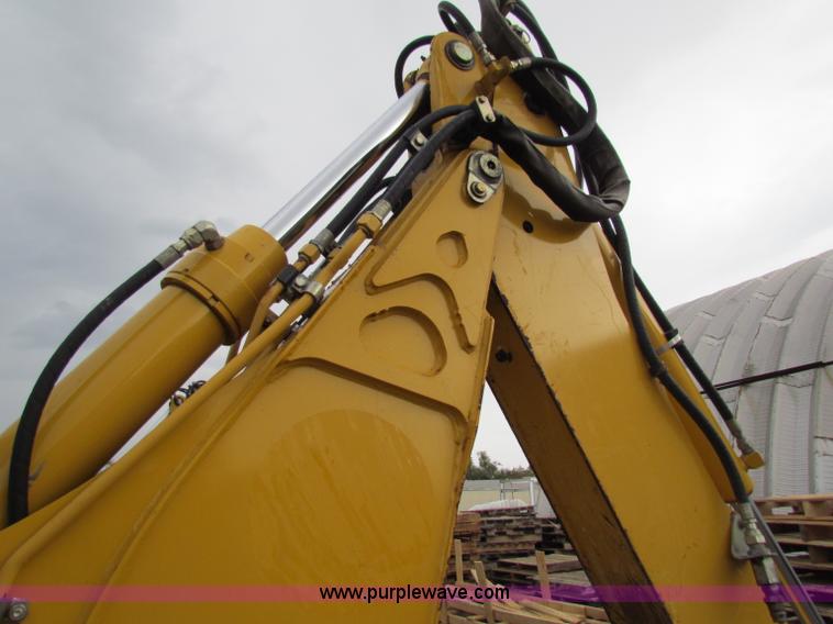 image for item E4168 2004 John Deere 310G backhoe