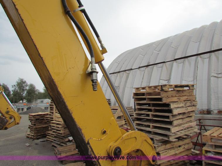 image for item E4168 2004 John Deere 310G backhoe