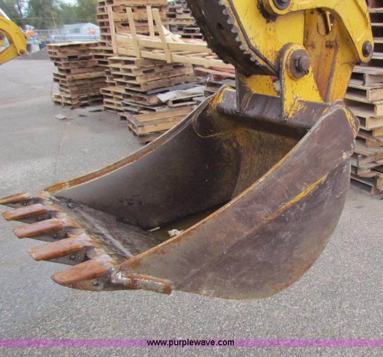 image for item E4168 2004 John Deere 310G backhoe