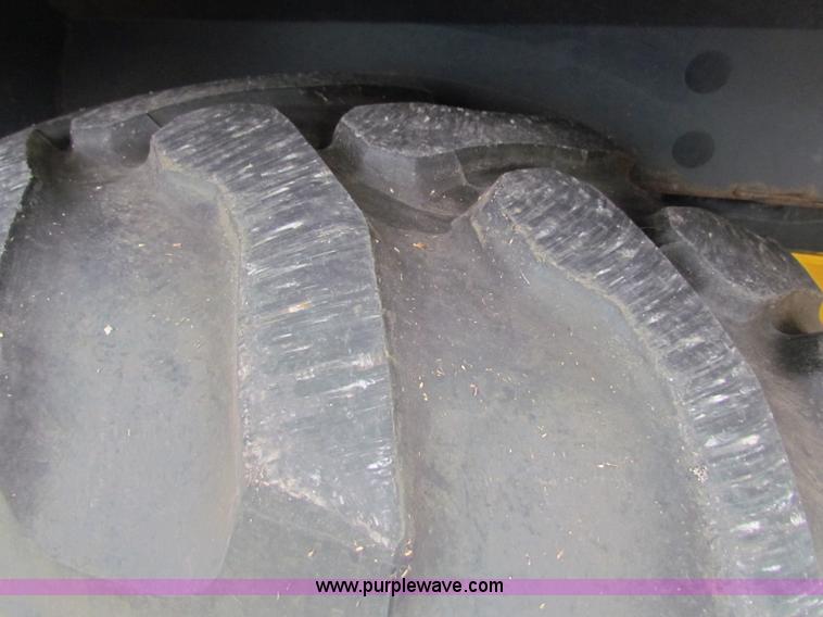 image for item E4168 2004 John Deere 310G backhoe