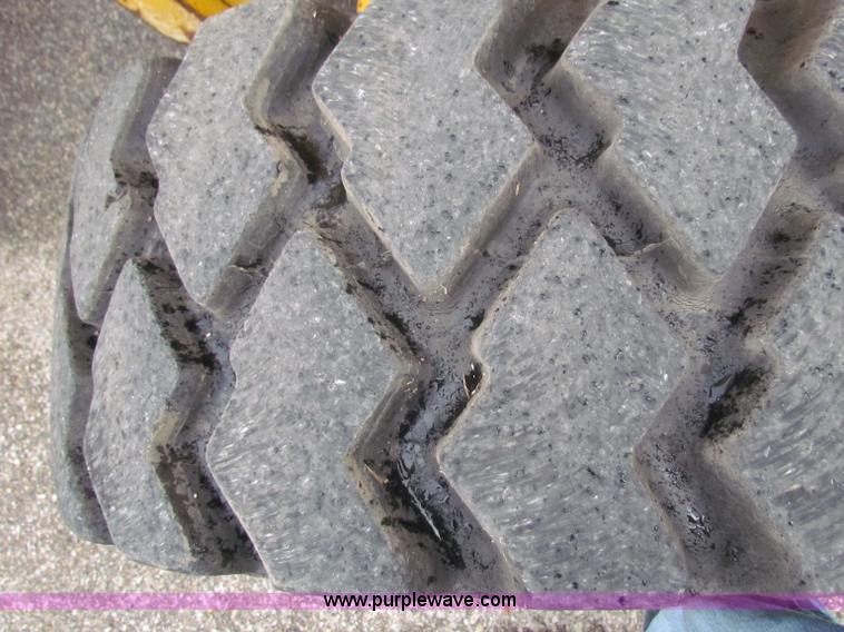 image for item E4168 2004 John Deere 310G backhoe