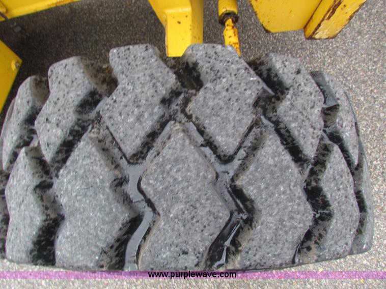 image for item E4168 2004 John Deere 310G backhoe