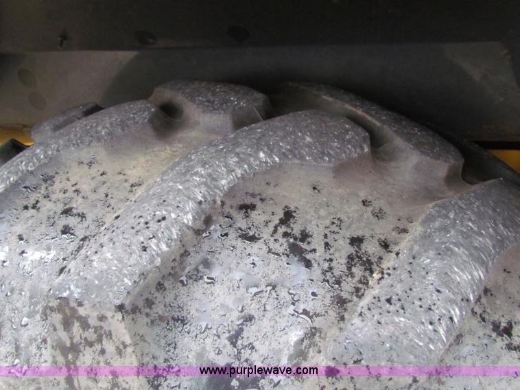 image for item E4168 2004 John Deere 310G backhoe