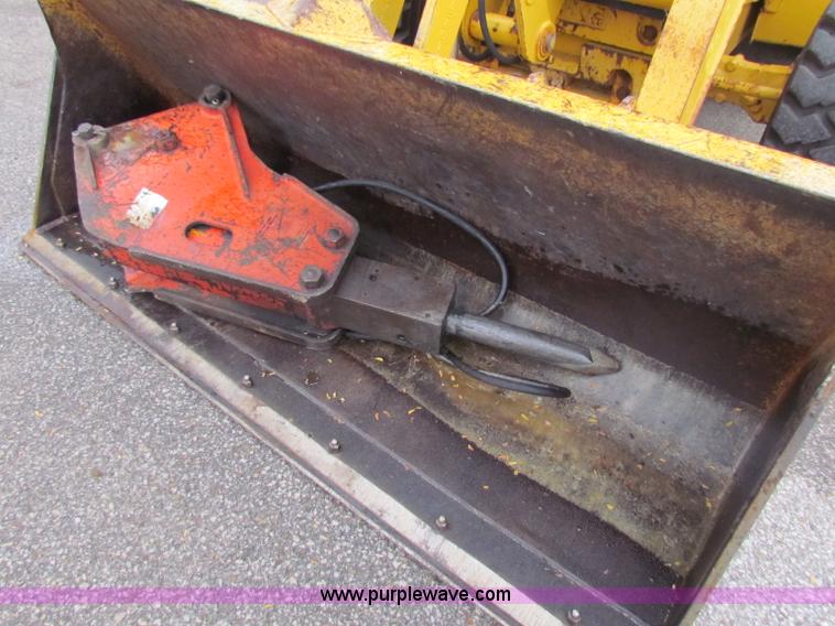 image for item E4168 2004 John Deere 310G backhoe