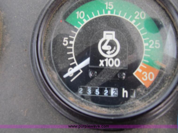 image for item E4169 1997 John Deere 310E backhoe