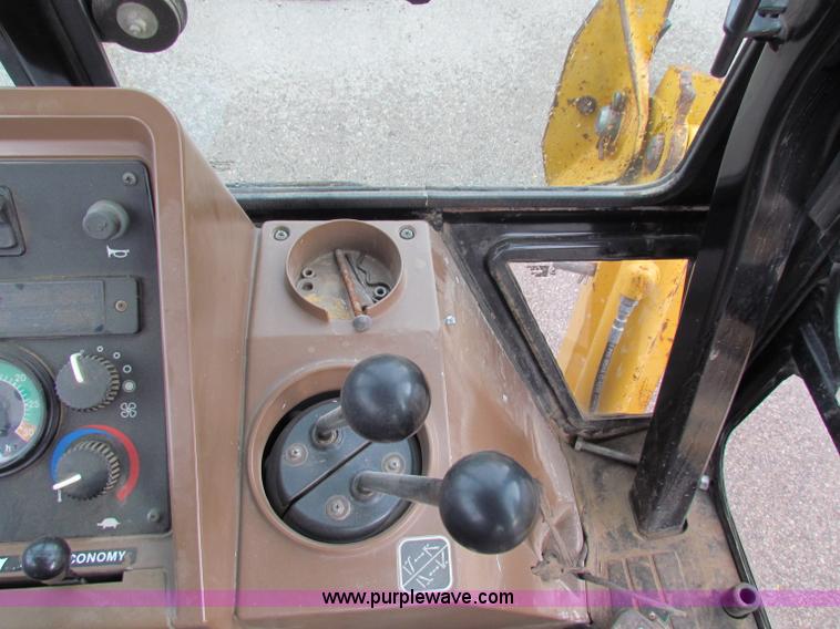 image for item E4169 1997 John Deere 310E backhoe