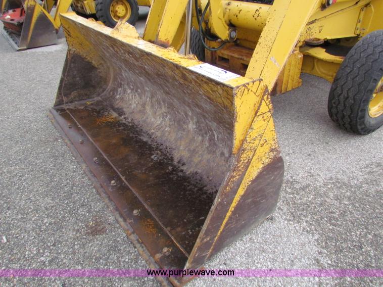 image for item E4169 1997 John Deere 310E backhoe
