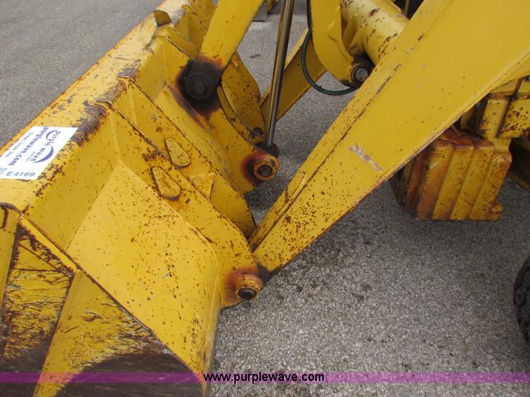 image for item E4169 1997 John Deere 310E backhoe