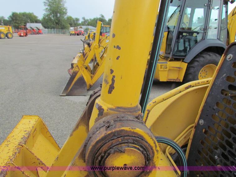 image for item E4169 1997 John Deere 310E backhoe