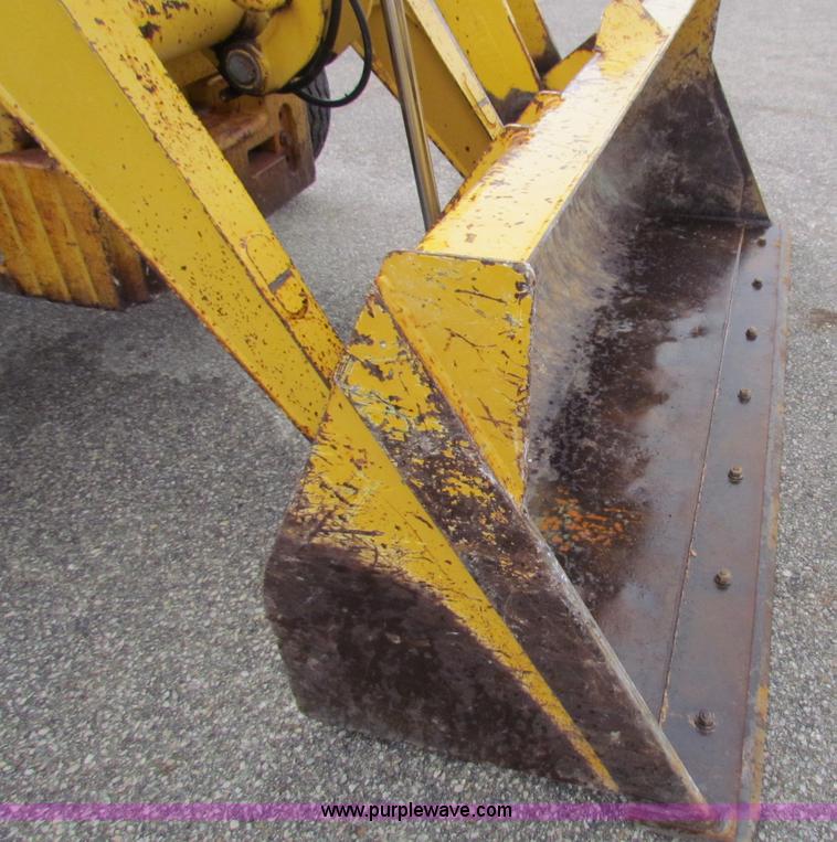 image for item E4169 1997 John Deere 310E backhoe