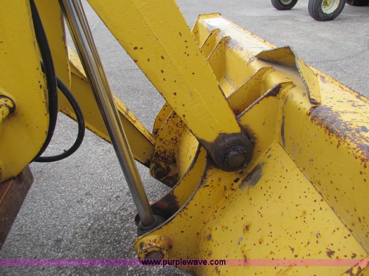 image for item E4169 1997 John Deere 310E backhoe