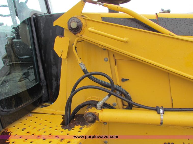 image for item E4169 1997 John Deere 310E backhoe