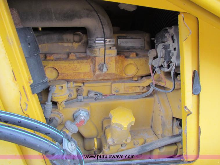 image for item E4169 1997 John Deere 310E backhoe