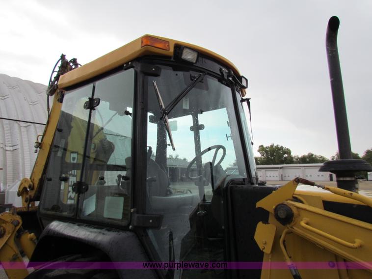 image for item E4169 1997 John Deere 310E backhoe