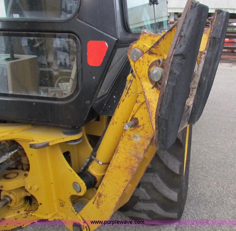 image for item E4169 1997 John Deere 310E backhoe