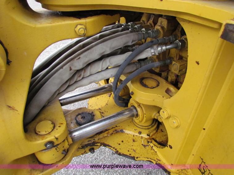 image for item E4169 1997 John Deere 310E backhoe