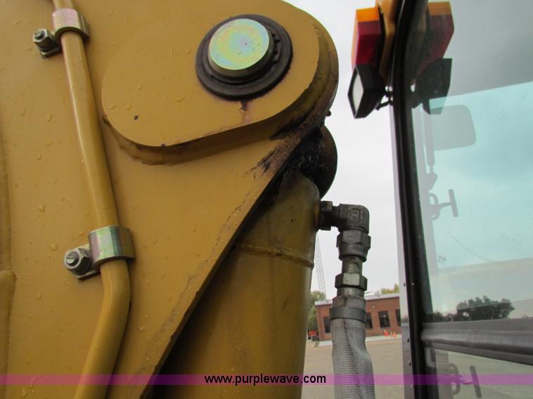 image for item E4169 1997 John Deere 310E backhoe