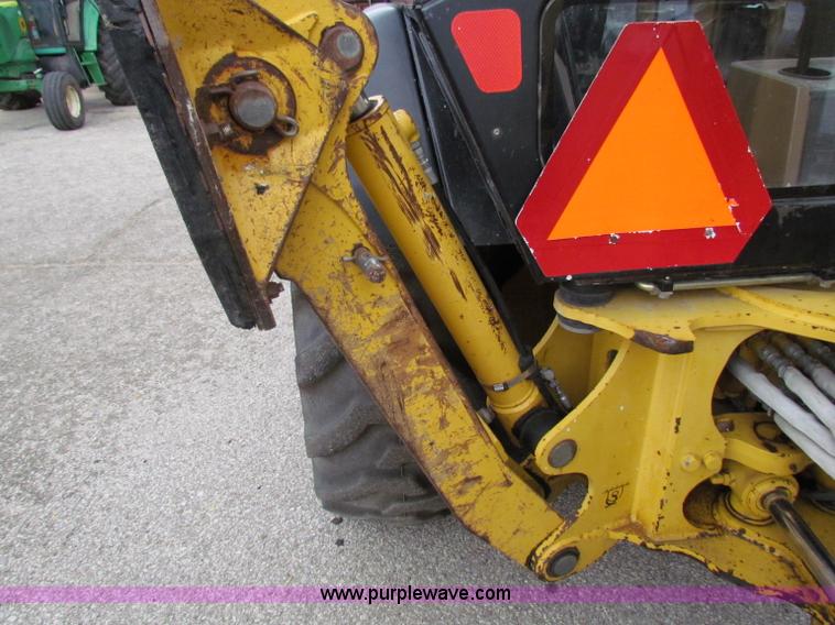 image for item E4169 1997 John Deere 310E backhoe