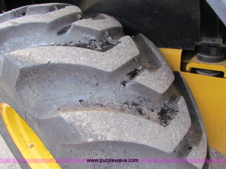 image for item E4169 1997 John Deere 310E backhoe