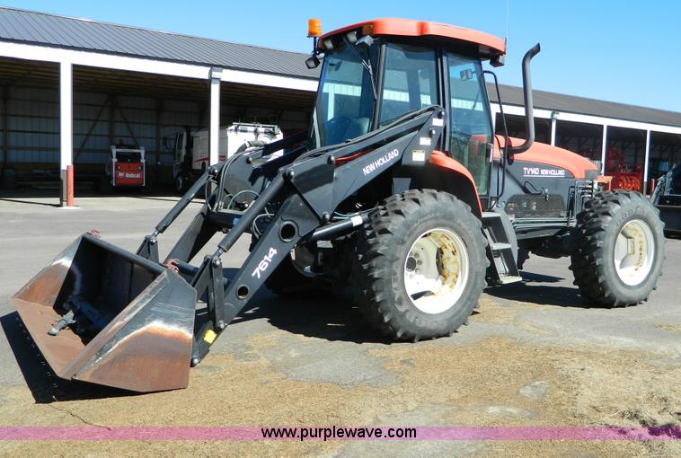 image for item E4189 2000 New Holland TV-140 bi-directional 4WD tractor