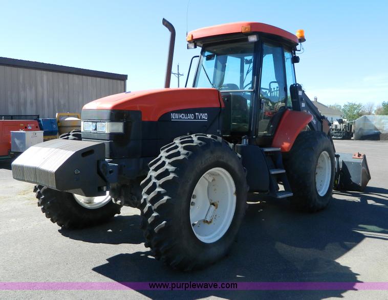 image for item E4189 2000 New Holland TV-140 bi-directional 4WD tractor