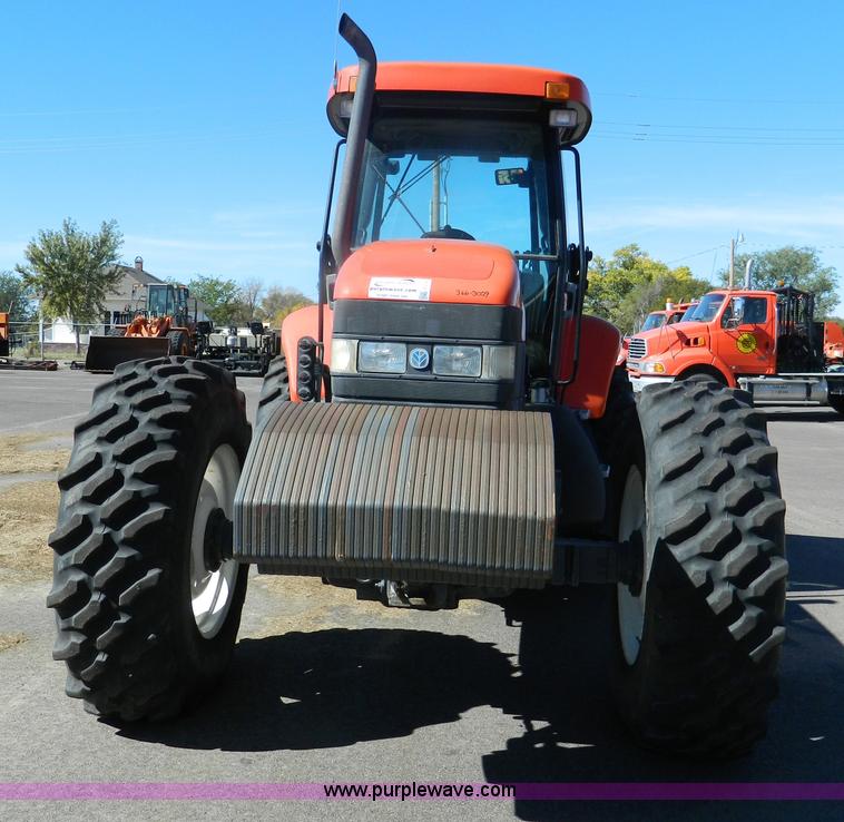 image for item E4189 2000 New Holland TV-140 bi-directional 4WD tractor