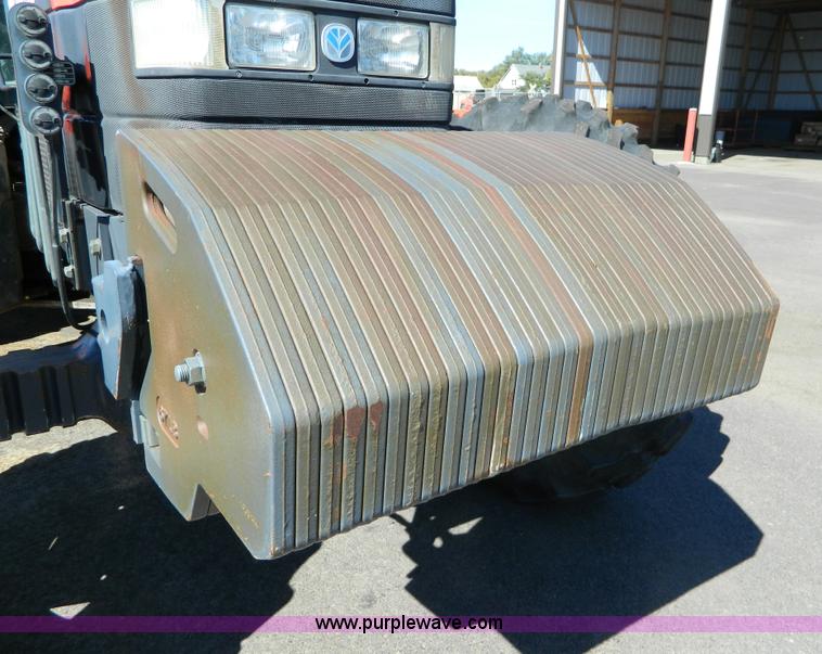 image for item E4189 2000 New Holland TV-140 bi-directional 4WD tractor