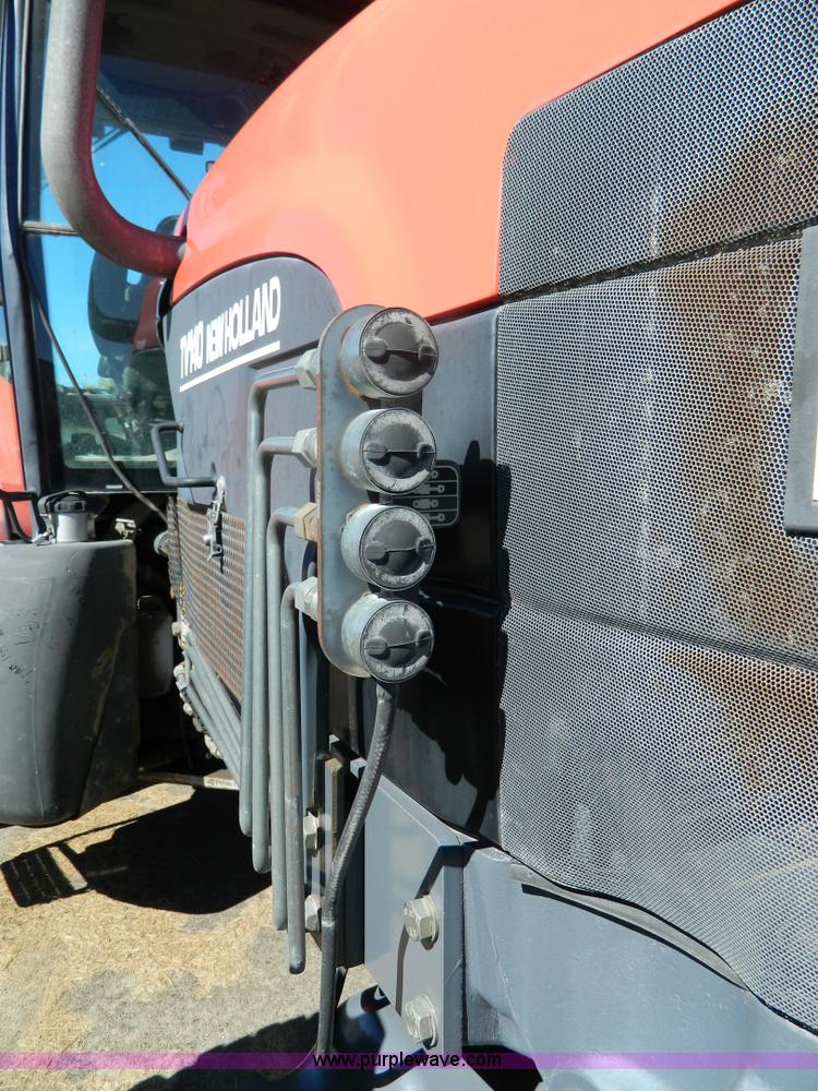 image for item E4189 2000 New Holland TV-140 bi-directional 4WD tractor