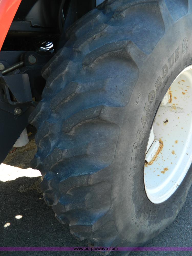 image for item E4189 2000 New Holland TV-140 bi-directional 4WD tractor