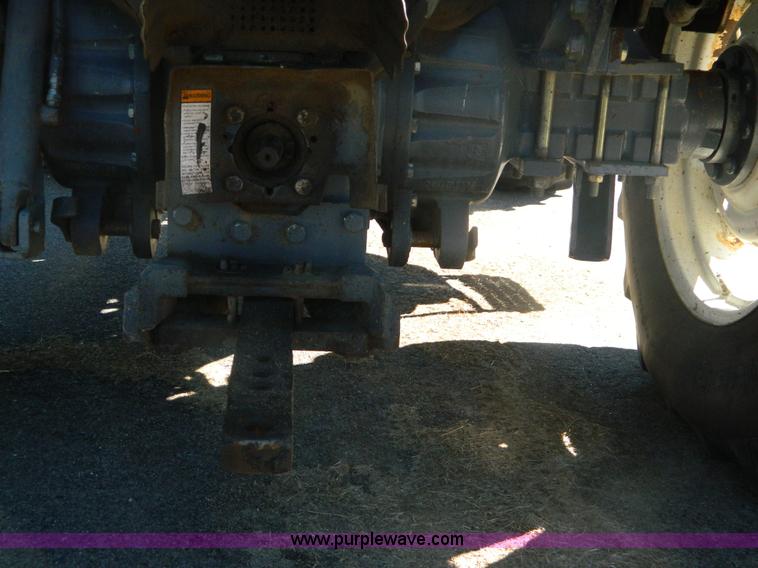 image for item E4189 2000 New Holland TV-140 bi-directional 4WD tractor