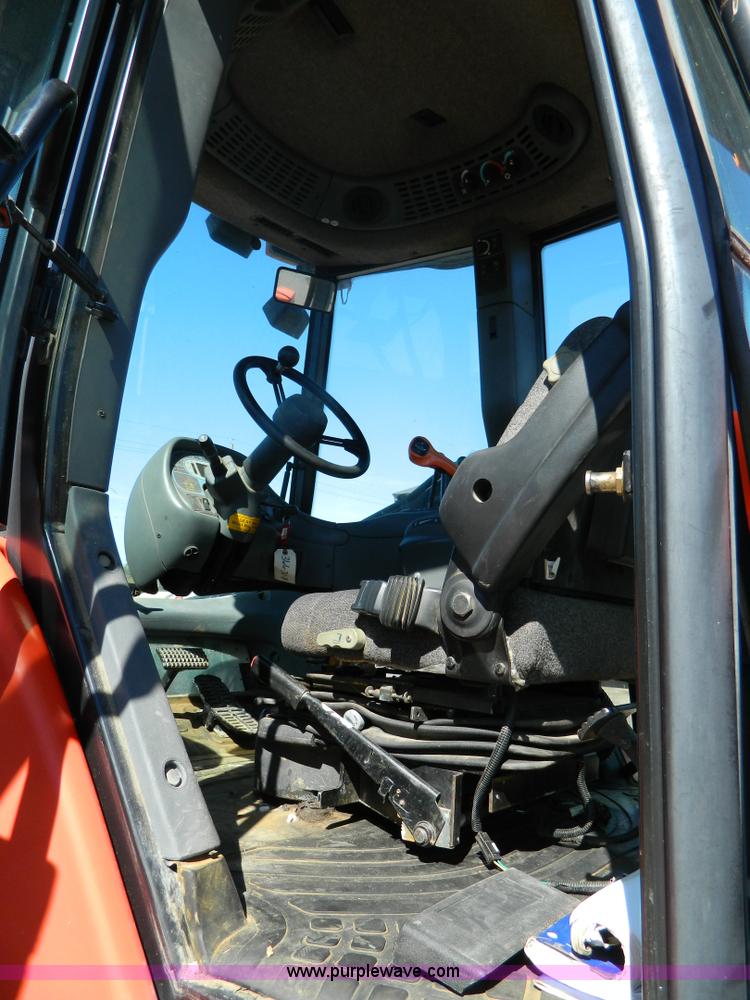 image for item E4189 2000 New Holland TV-140 bi-directional 4WD tractor