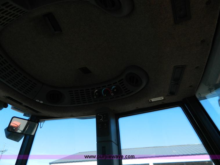 image for item E4189 2000 New Holland TV-140 bi-directional 4WD tractor