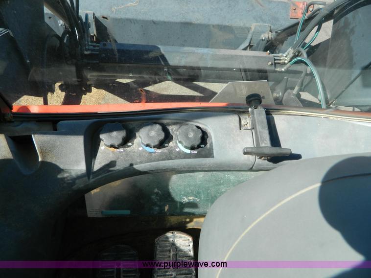 image for item E4189 2000 New Holland TV-140 bi-directional 4WD tractor