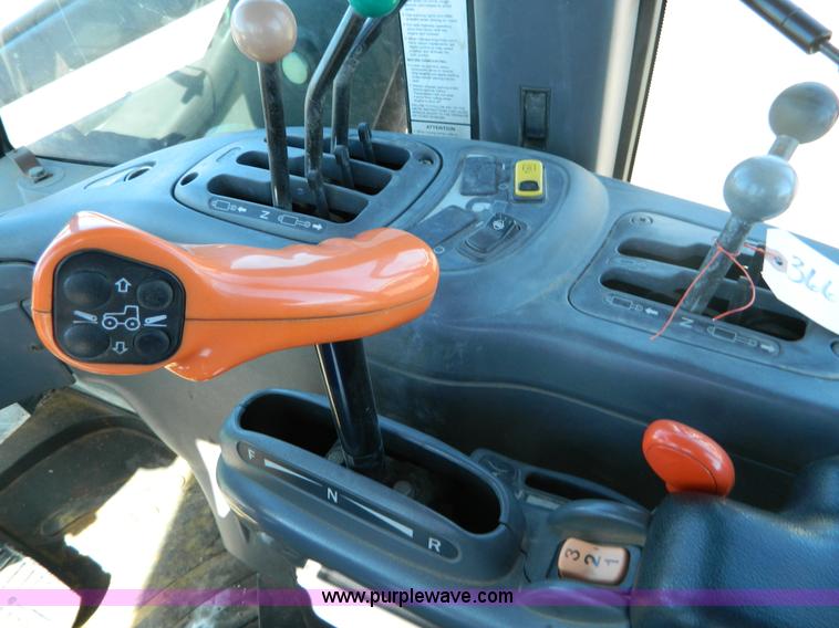 image for item E4189 2000 New Holland TV-140 bi-directional 4WD tractor