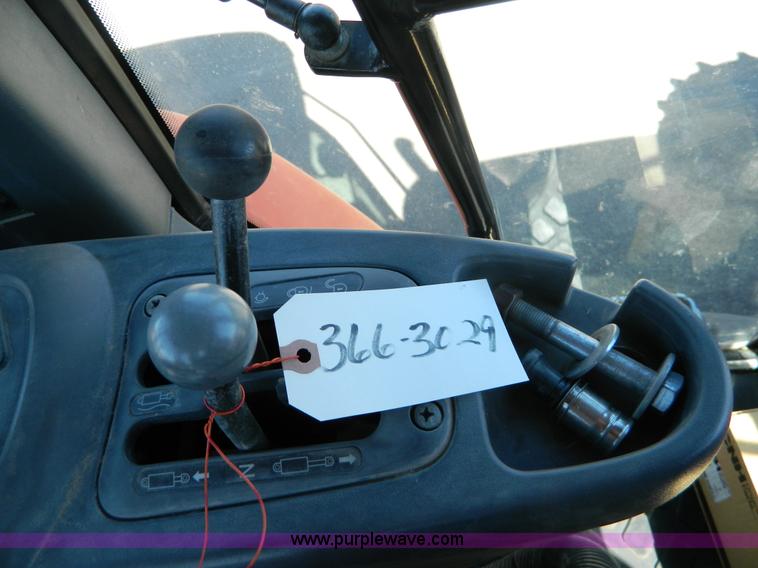 image for item E4189 2000 New Holland TV-140 bi-directional 4WD tractor