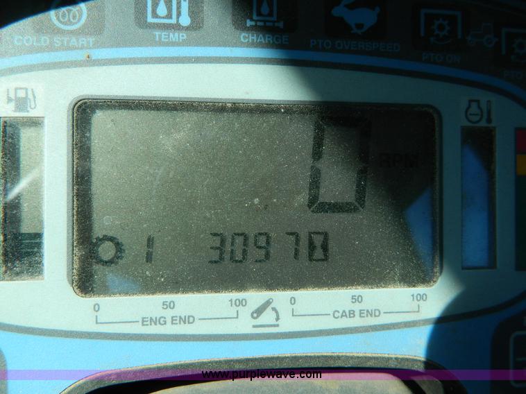 image for item E4189 2000 New Holland TV-140 bi-directional 4WD tractor