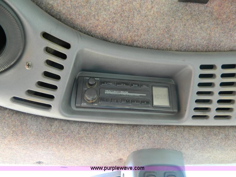 image for item E4189 2000 New Holland TV-140 bi-directional 4WD tractor